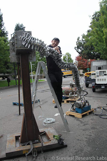 Chris Bohren works on the Spine Robot